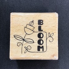 Graphic Flower w/Bloom Written beside it Rubber Stamp 2x2" Light Stain