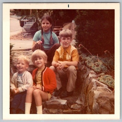 Vtg Color Snapshot Four Siblings Children Sitting On Stone Steps Fashion 1970s
