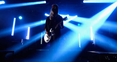 Luke Hemmings of 5 Seconds of Summer performs at the iHeartRadio H - Old Photo