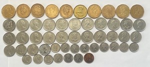 Canada Coins $1 Dollar (10X), Quarters (19X), 10 Cent (15X), 5Cent (7X), 1 Cent.