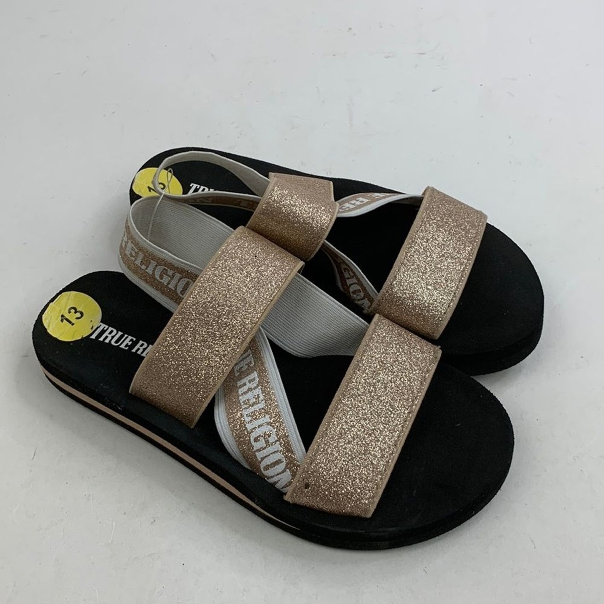 black and rose gold sandals