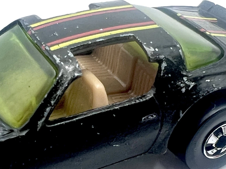 Hot Wheels 1977 Black Hot Bird Pontiac Trans Am RARO (vidrio amarillo) Foto 4 de 4