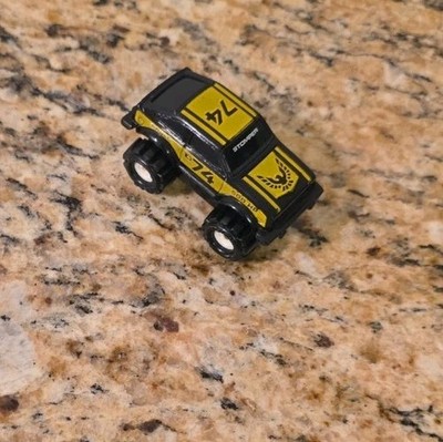 1985 Schaper Stomper Mini 4x4 74 AMC Eagle Toy Black and Yellow Happy Meal Toy
