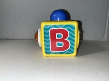 Fisher Price Stacking Action Block Has The Letter B The 2 On It