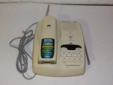 Vintage Uniden 900 MHz cordless phone with a digital answering system.