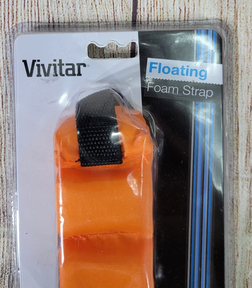 Correa de muñeca de espuma flotante naranja Vivitar para cámara + SLR + videocámara Foto 3 de 4