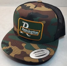 Remington Arms Patch on Trucker Hat Yupoong/YP Classics 6006 Snapback Camo/Black