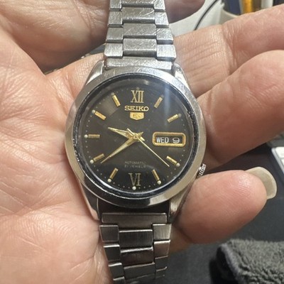 Seiko 5 Automatic 21J Wristwatch Day/Date Black/Gold Dial Steel Bracelet