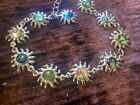 Vintage Bracelet featuring sun-shaped links with multicolored stones