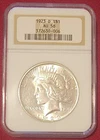 Peace Silver Dollar 1923 D AU58 NGC holder