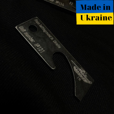 bottle opener keychain of Russian combat tank from Ukraine 2023