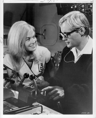 Margaret Hanford Phil Volker at a control panel in the film Around- Old Photo