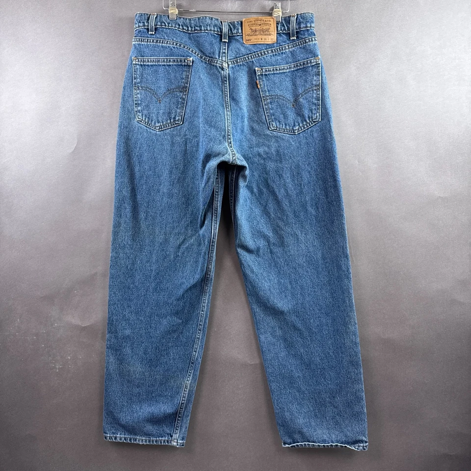Pantalones de mezclilla vintage Levis para hombre 36x32 azul 565 pierna ancha lengüeta naranja años 90 hechos en EE. UU. Foto 4 de 4