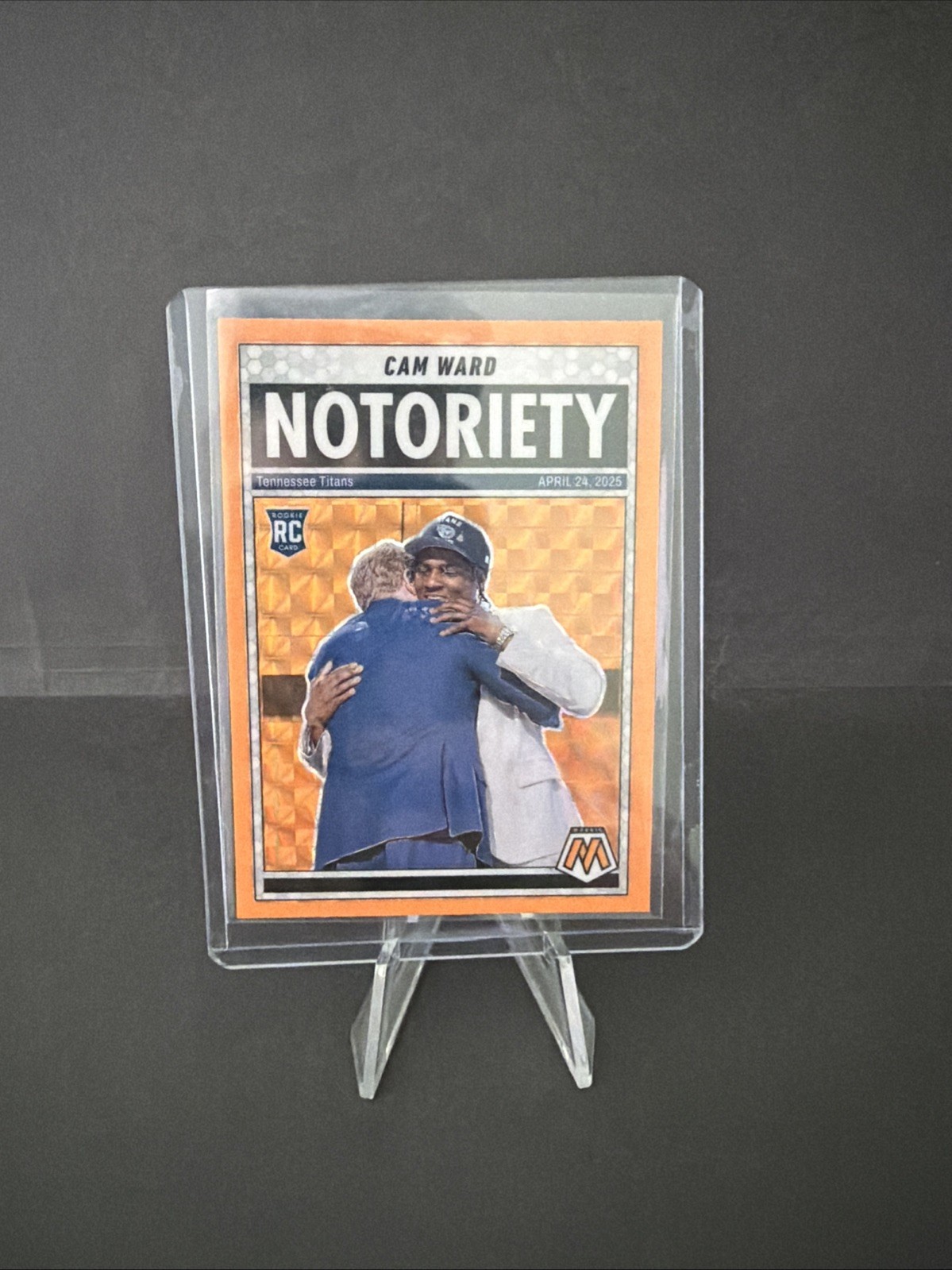 2025 Mosaic Football - Cam Ward RC Notoriety Orange Prizm #17