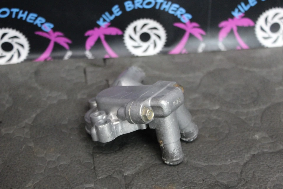 1999 Kawasaki 92-99 KX250 OEM двигатель водяной насос крышка корпуса 16142-1117 - Изображение 3 из 4