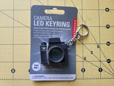KIKKERLAND camera LED keyring light and sound toy vintage