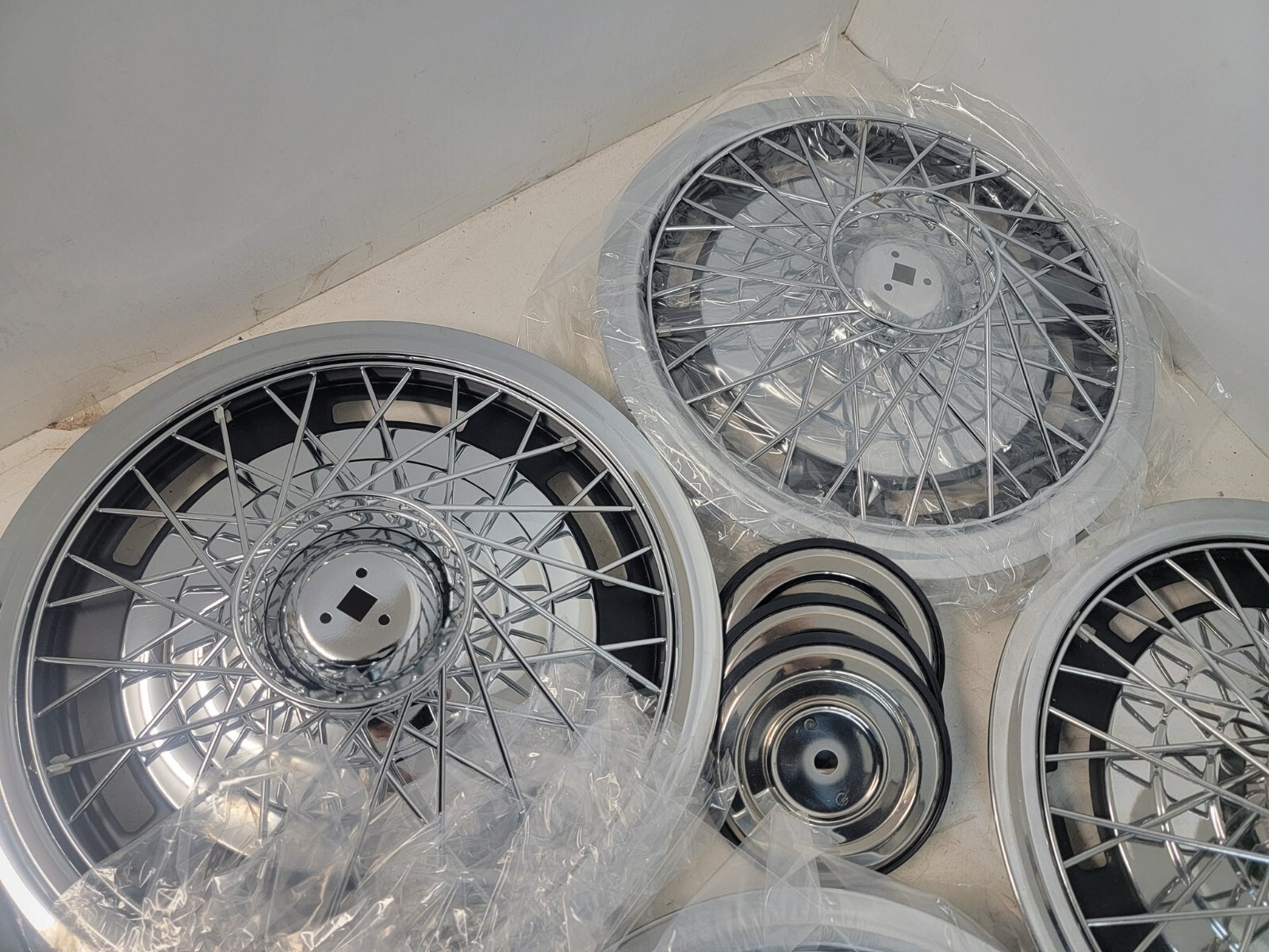 Set of (4) Vintage NOS DelMet 14inch Locking Wire Wheel Covers