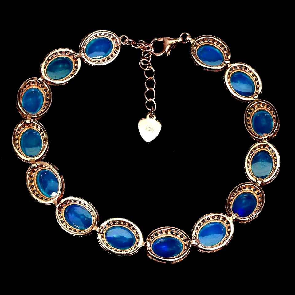 PULSERA ÓPALO DE FUEGO AZUL CON DETALLES DE CIRCONITA BLANCA PLATA DE LEY 925 14K RGP 7 IN Foto 3 de 3
