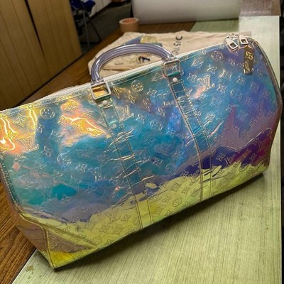 louis vuitton christopher backpack clear in Prism PVC  Weekly Lux Drop Crafted from damier graphite coated canvas Christopher MM Monogram Eclipse -