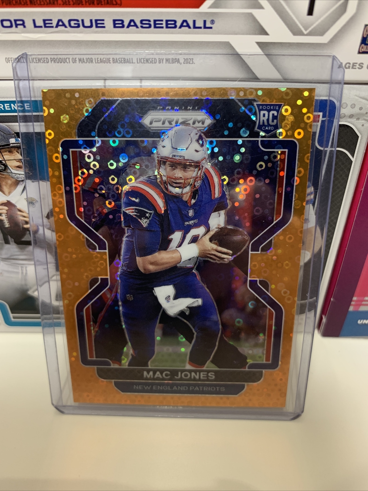 2021 Panini Prizm Mac Jones Orange Disco Rookie RC #336 New England Patriots