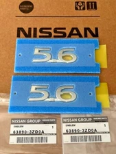 New OEM Infiniti QX56 QX80 Side Fender Badge Emblem 5.6 SET of 2 63890-3ZD0A