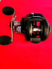 ZEBCO/Quantum Smoke  SL 151 Hpt reel NEW IN BOX