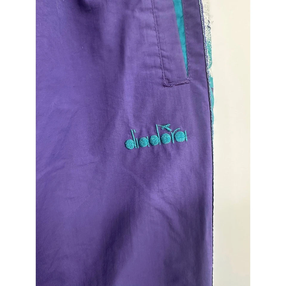 Pantalón de chándal Diadora MVB para hombre púrpura retro forrado de malla al tobillo cremallera talla M Foto 4 de 4