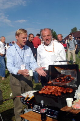 Ari Vatanen and David Richards sample the local fayre in the form- 2002 Photo