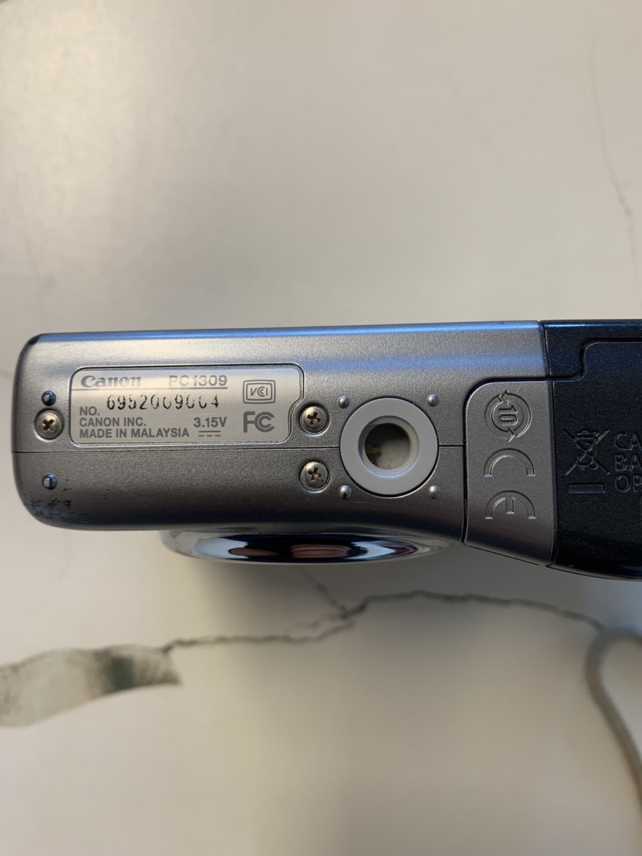 Canon PowerShot A1000 IS Digital Camera Silver Black For Parts Or