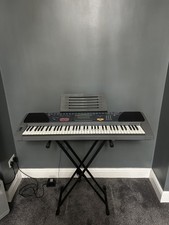 CASIO WK-1200 Touch Response Keyboard with Power Supply & Stand 