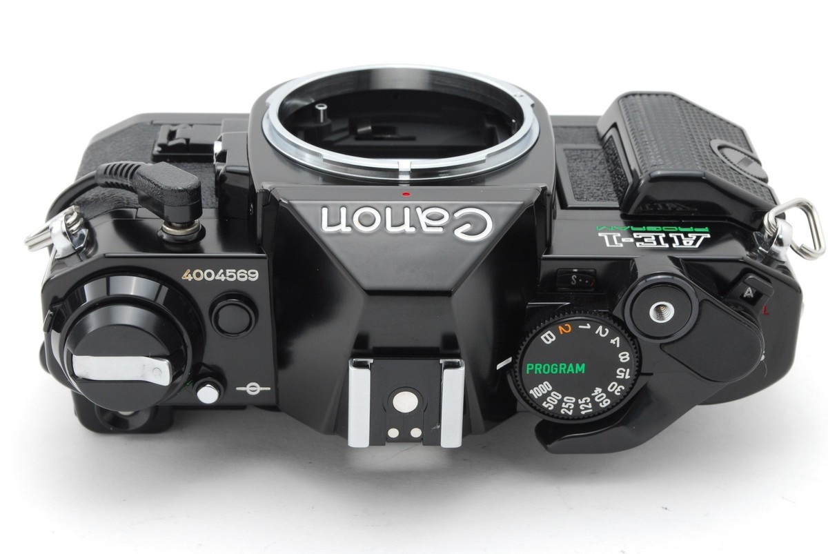 稼働品】 キヤノン Canon AE-1＋35-70mm 1:1.35-4.5 Canon AE-1 Program Chrome 35mm Film SLR Camera 35-70mm Zoom Lens [EXC]