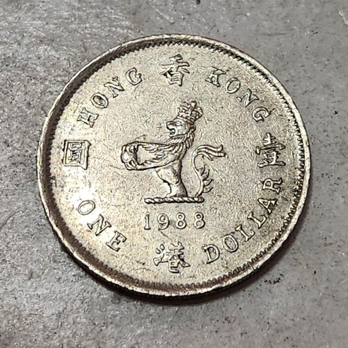 MONETA DA UN (1) DOLLARO HONG KONG 🇭🇰 1988 (REGINA ELISABETTA II) - Foto 1 di 2