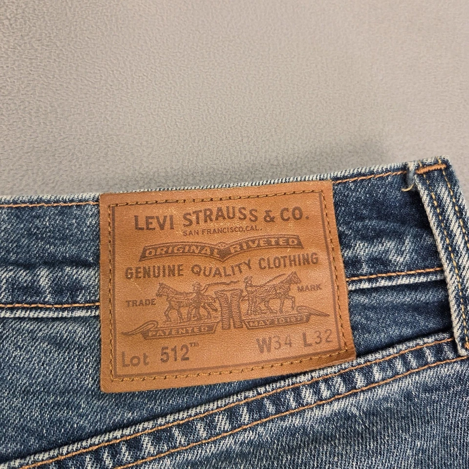 Jeans Levi's Premium 512 para hombre 32x30 ribete ajustado cónico desgastado etiqueta 34x32 Foto 4 de 4