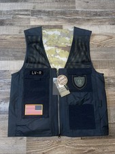Chaleco utilitario Nike LAS VEGAS RAIDERS Salute to Service NKE1-00A precio de venta sugerido por el fabricante 125 USD nuevo con etiquetas pequeño