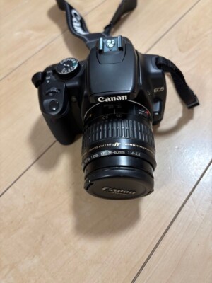 Canon EOS KISS DIGITAL X SLR camera With three zoom lenses