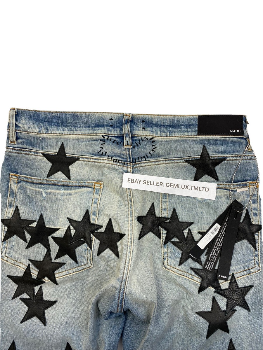 AMIRI X CHEMIST STAR LEATHER APPLIQUÉD BLUE JEANS SIZE: 34 AMIRI X CHEMIST STAR LEATHER APPLIQUÉD BLUE JEANS SIZE: 34