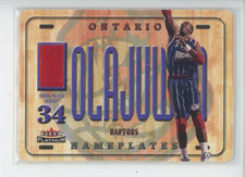 HAKEEM OLAJUWON JERSEY LOGO PATCH 2001-02 FLEER PLATINUM NAMEPLATES SP GAME-WORN