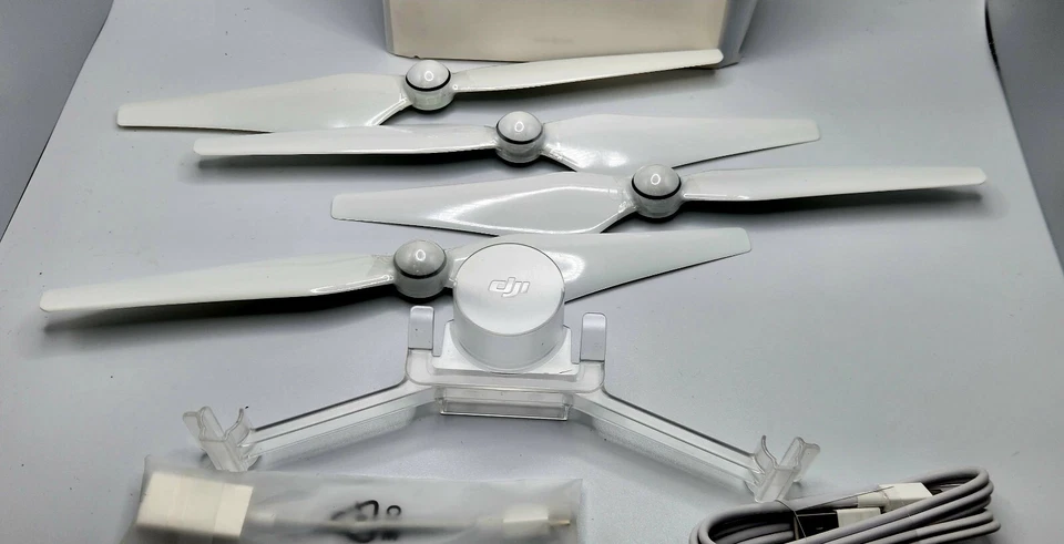 Genuine DJI Phantom 4 Series Accessories Kit | Propellers, Gimbal Holder & Cable - Image 4 of 4