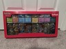 Pokémon Scarlet & Violet Prismatic Evolutions Mini Tin 8-Pack Booster Promo Box