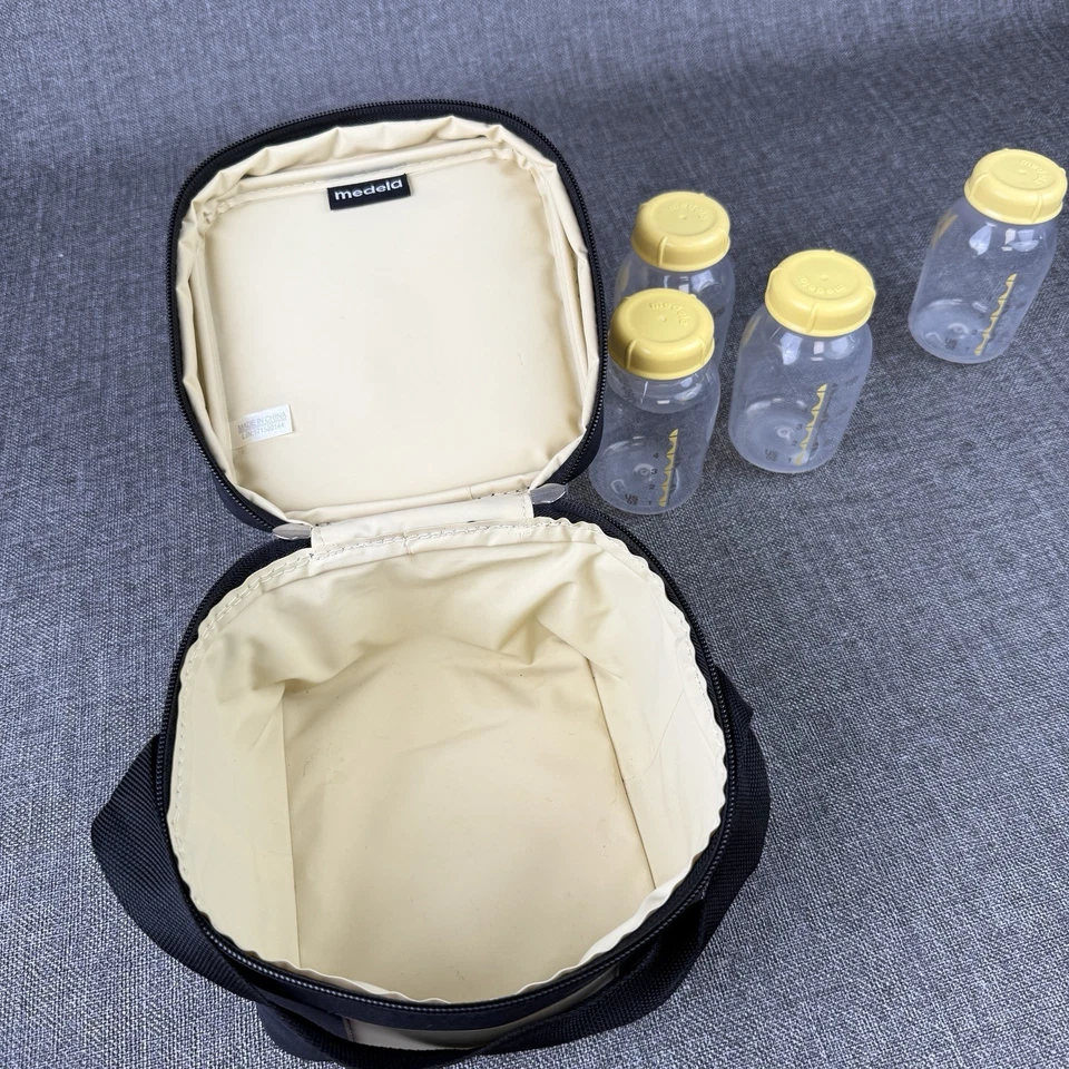 Lote de 7 biberones y tapas de almacenamiento de leche materna Medela de 5 oz/150 ml Foto 4 de 4