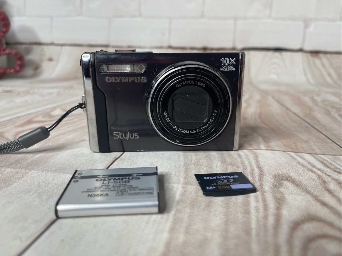 Olympus Stylus 9000 Digital Camera - Black - Battery and 2GB Olympus Stylus 9000 Digital Camera - Black - Battery and 2GB