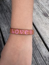 Leather stamped bracelet with magnetic closure,