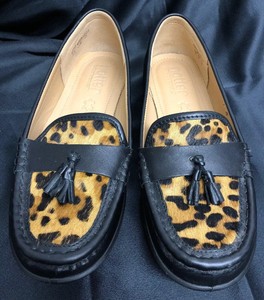 black and leopard print loafers