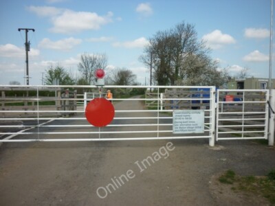 Photo 6x4 Waiting for the gatekeeper to open the gates Aisby/SK8792 Bons c2011