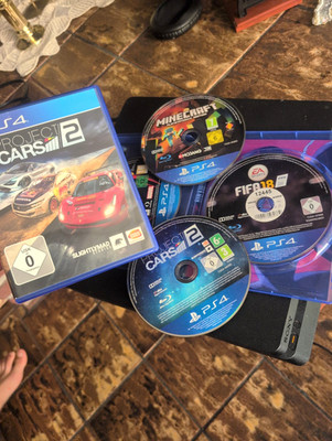 PS4 Spiele Lot: Project CARS 2, FIFA 18, Minecraft, Marvel s Spider-Man Hits