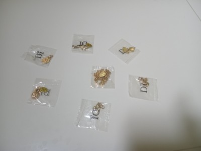DIAMONDS INTERNATIONAL CHARM BRACLET WITH 6 CHARMS DI SEASHELL/FLIPFLOP/LIZARD 