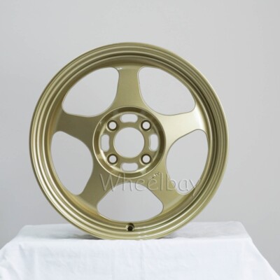 4 ROTA WHEELS SLIPSTREAM  15X6.5  4X100 40 HB: 67.1  GOLD  12.8 LBS.