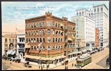 1936 Spokane WA Postcard Howard & Riverside Busy Corner Streetcar Scene