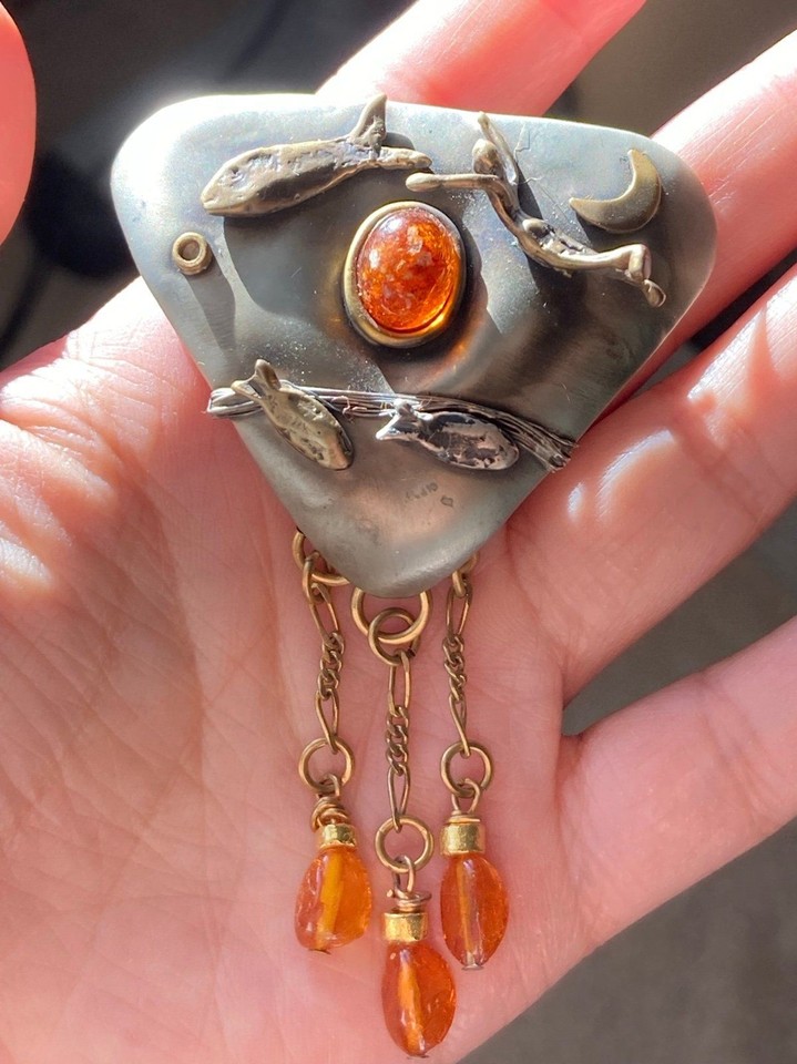 Vintage artisan handcrafted fish moon Baltic amber brooch