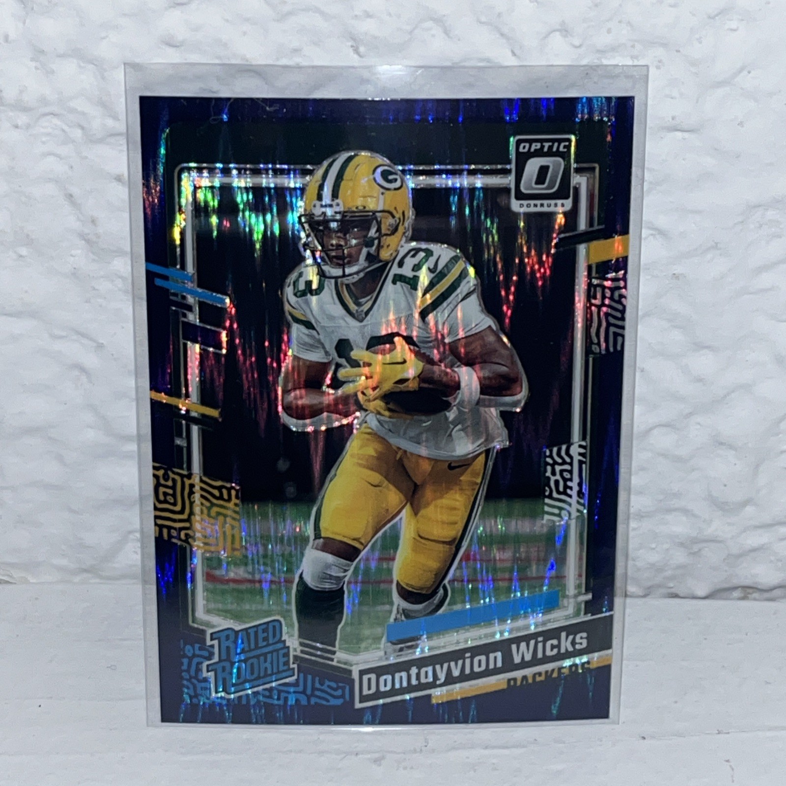 2023 Donruss Optic Dontayvion Wicks Purple Shock Prizm Rated Rookie #249 Packers